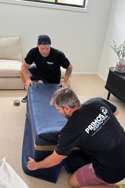 movers packing a table